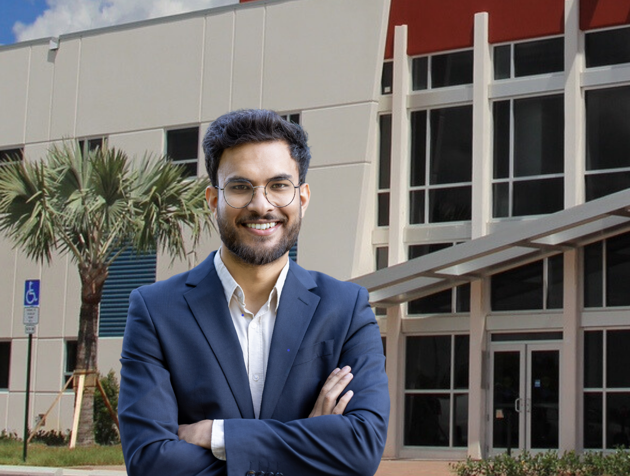 Business Professional in front of Broward College Central Campus Library