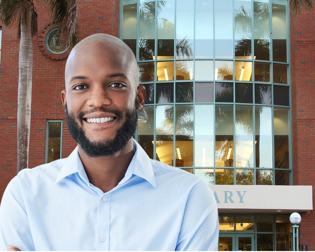 Business Professional in front of Broward College Central Campus Library