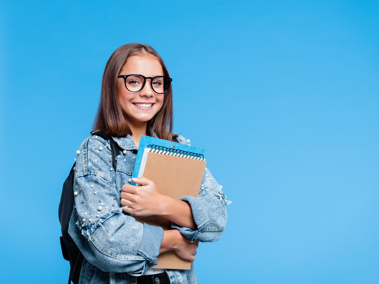 girl with glasses and computer.