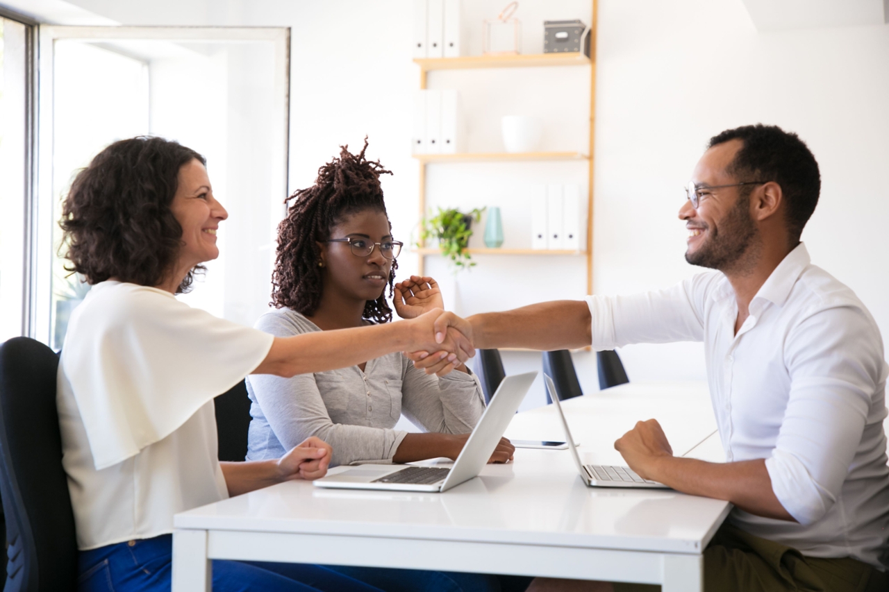 Group of business partners discussing resources