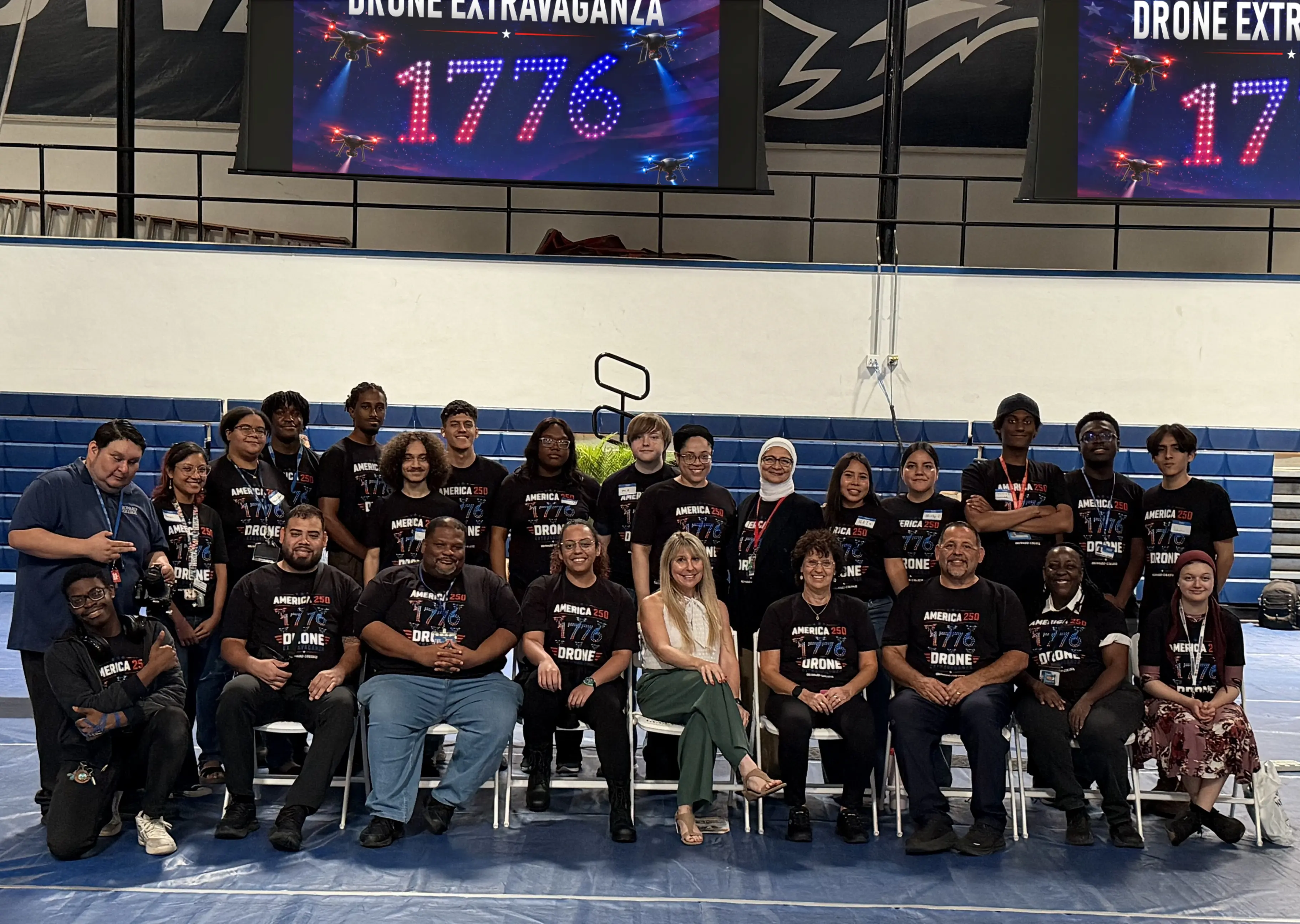 Students and staff posing together at the America 250 Drone Extravaganza